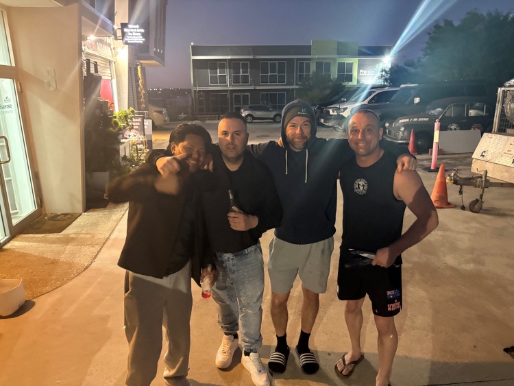 adam with student and friends